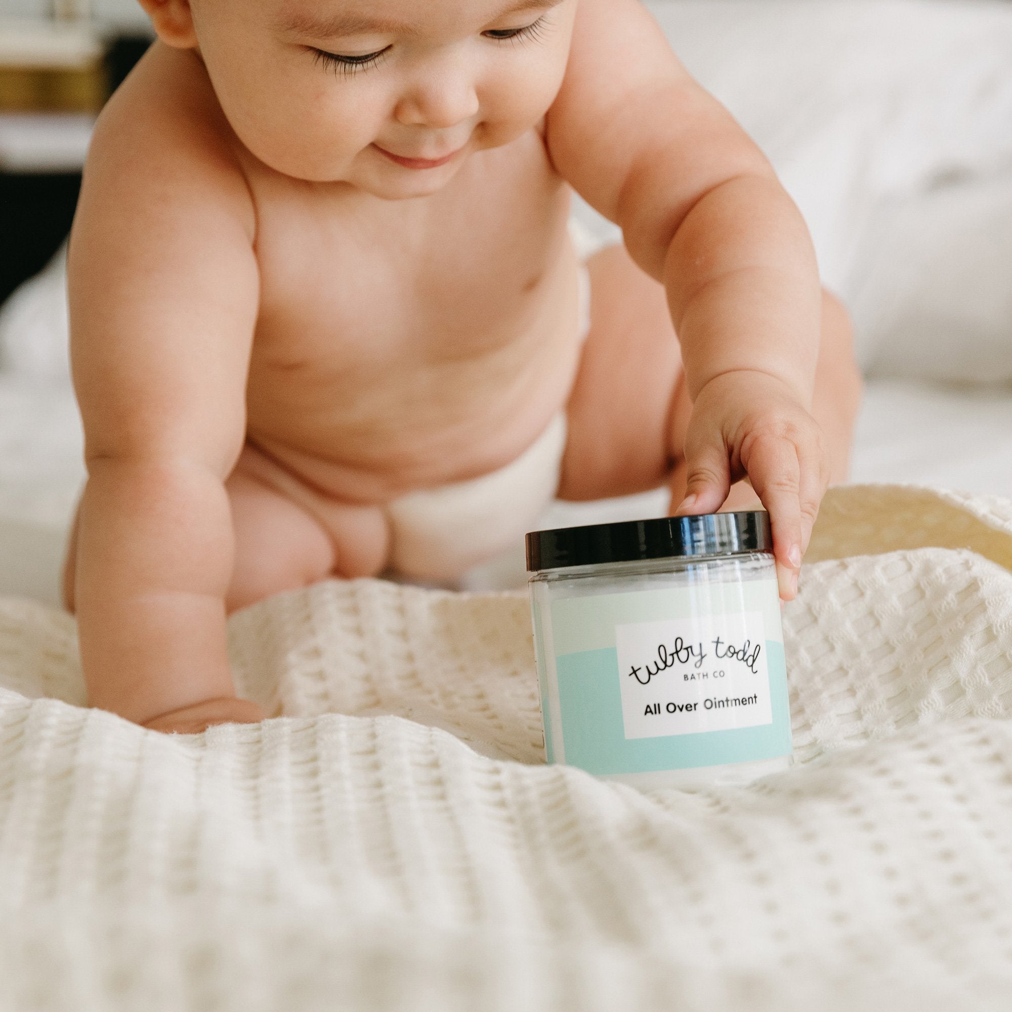 Baby with Tubby Todd All Over Ointment